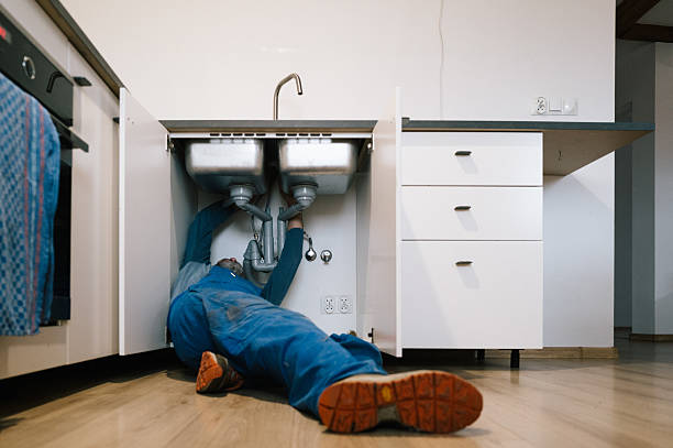 Professional Emergency Plumber technician working in Versailles, CT